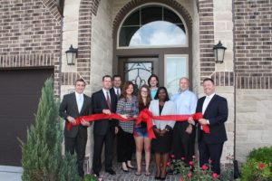 Benefit Homes ribbon cutting Perry Homes and Bridgeland